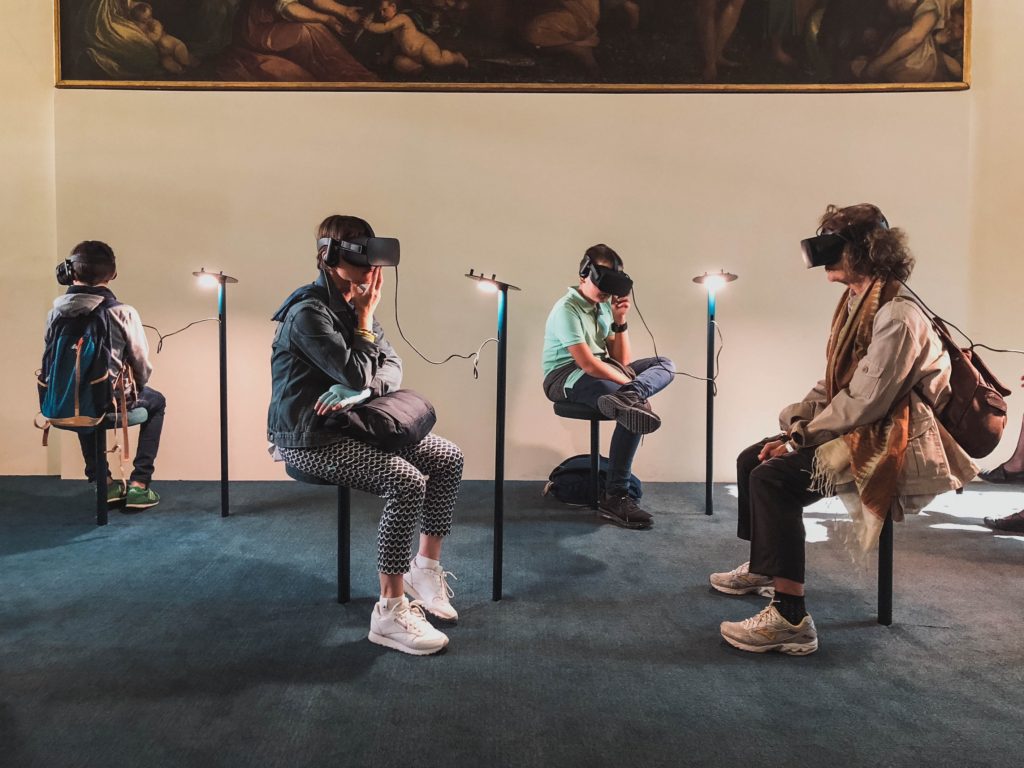 People experiencing through VR and AI technologies