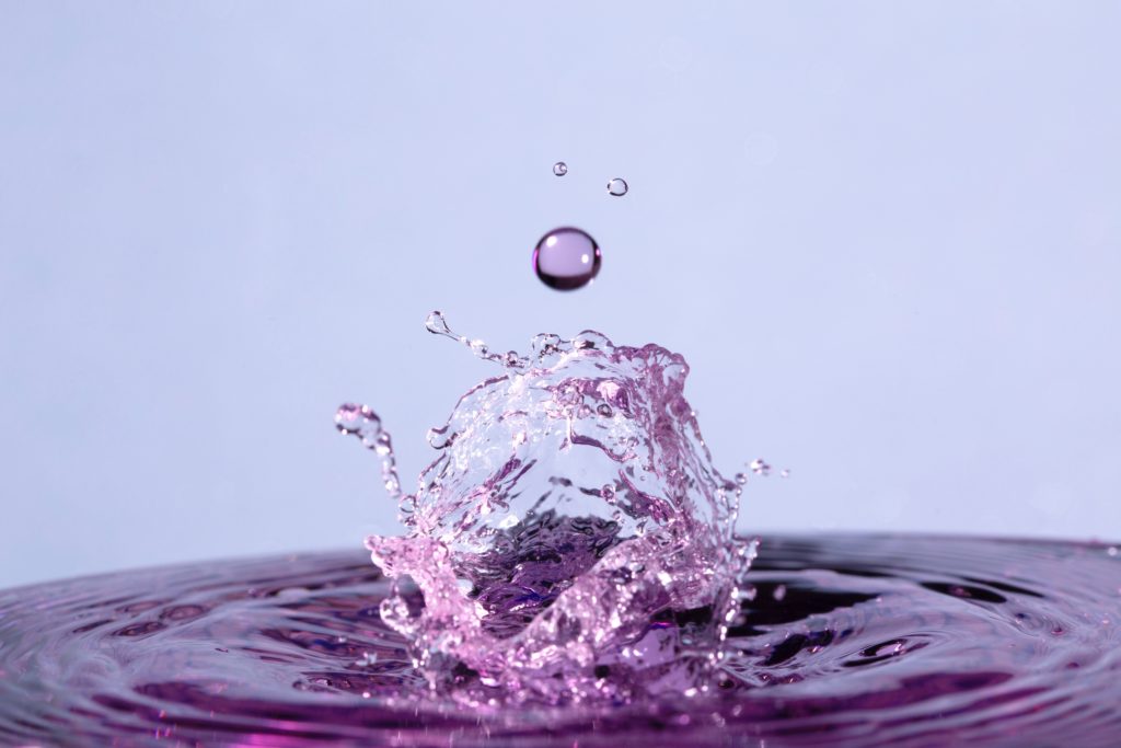 a drop of water causing a ripple effect of change.