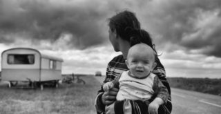A mom holding a baby