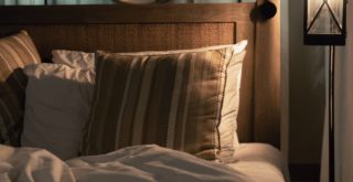 A couple sleeping in bed